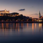Bratislava Castle Towering Over Danube River at Sunset