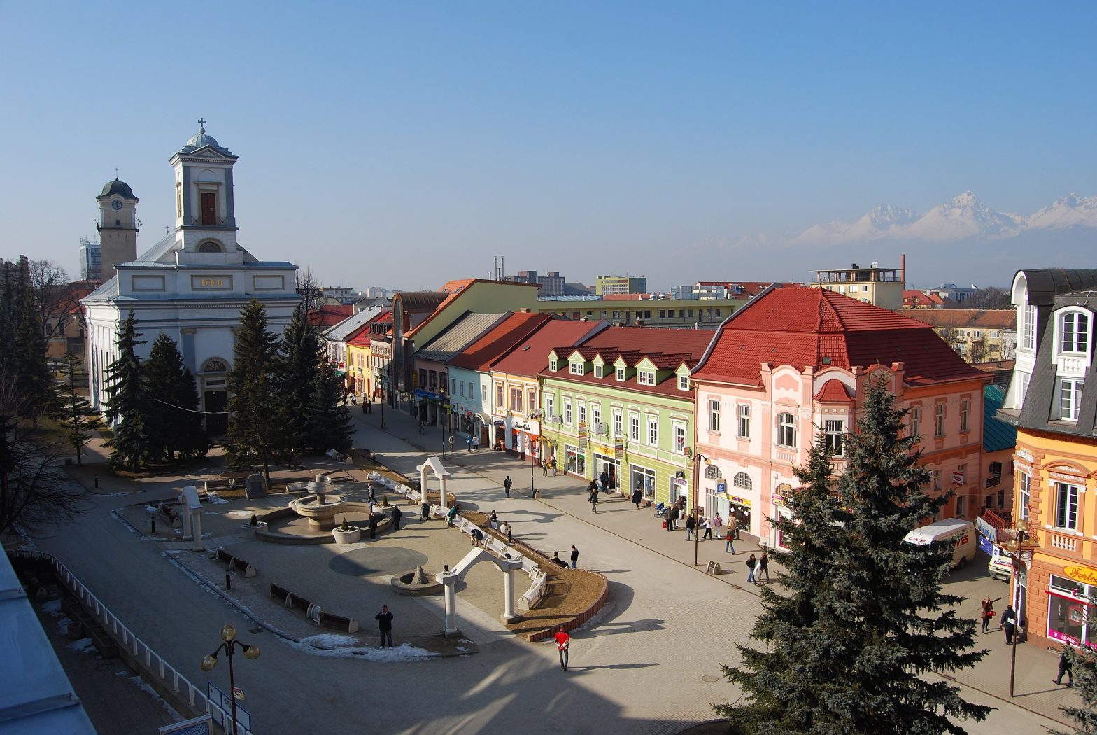 Poprd Main Square, Peaks of High Tatras Seen in Upper Right Section